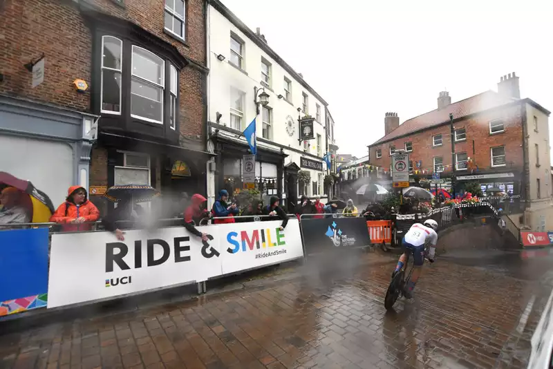 Heavy rain and flooding cause delays in the World Championship Women's Time Trial.